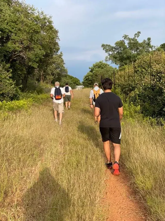 Hikers walking a De Wildt hiking trail.